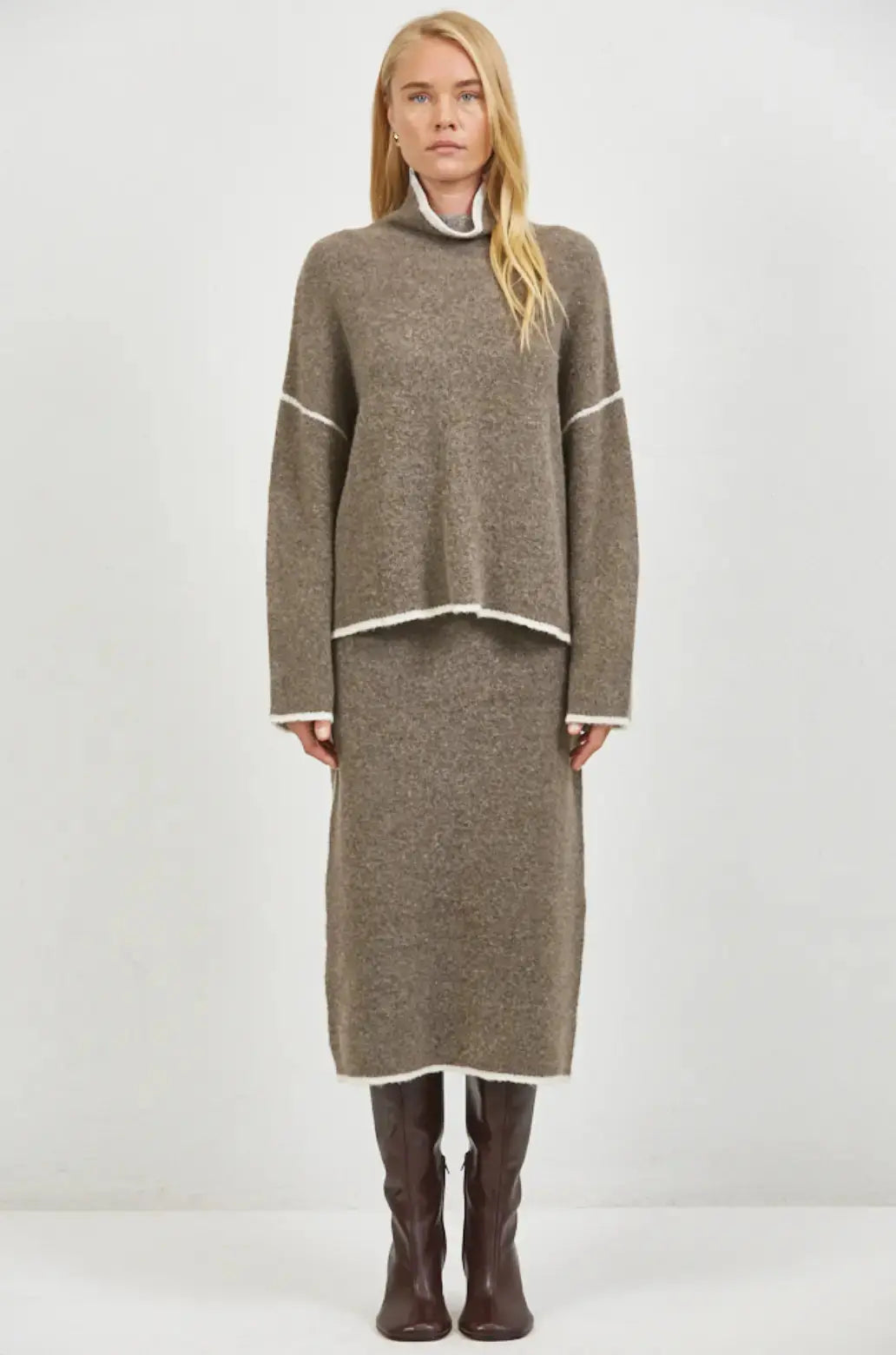 A.ren Brianne Sweater in extra small size, soft knit fabric, featuring a relaxed fit and ribbed cuffs, shown in a neutral color.