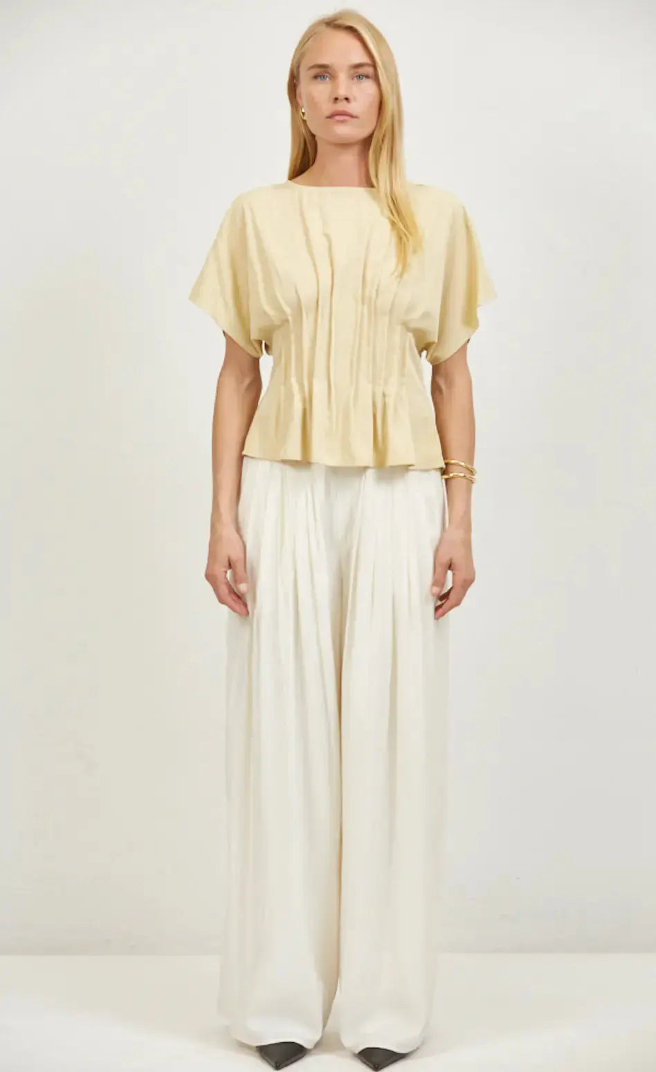 A.ren Leah Top in extra small size, stylish women's apparel with a fitted design and soft fabric, displayed on a neutral background.