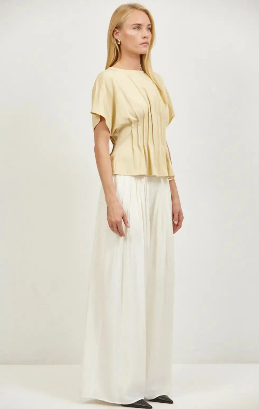 A.ren Leah Top in extra small, stylish apparel with a fitted design and soft fabric, displayed on a plain background.