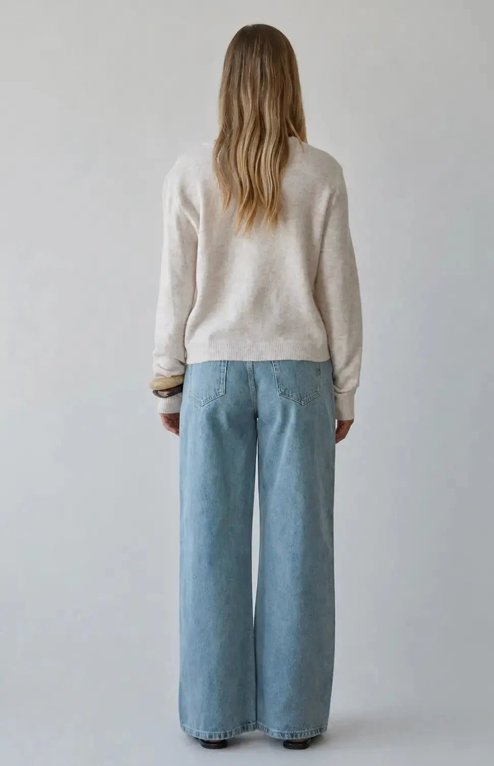 A.ren The Haven beige knit sweater, cozy apparel with a textured knit pattern, shown on a neutral background.