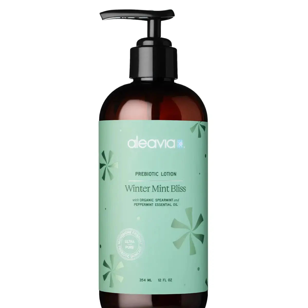 Aleavia Winter Mint Body Lotion in a bath bottle with mint leaves, showcasing a refreshing and soothing skincare product.
