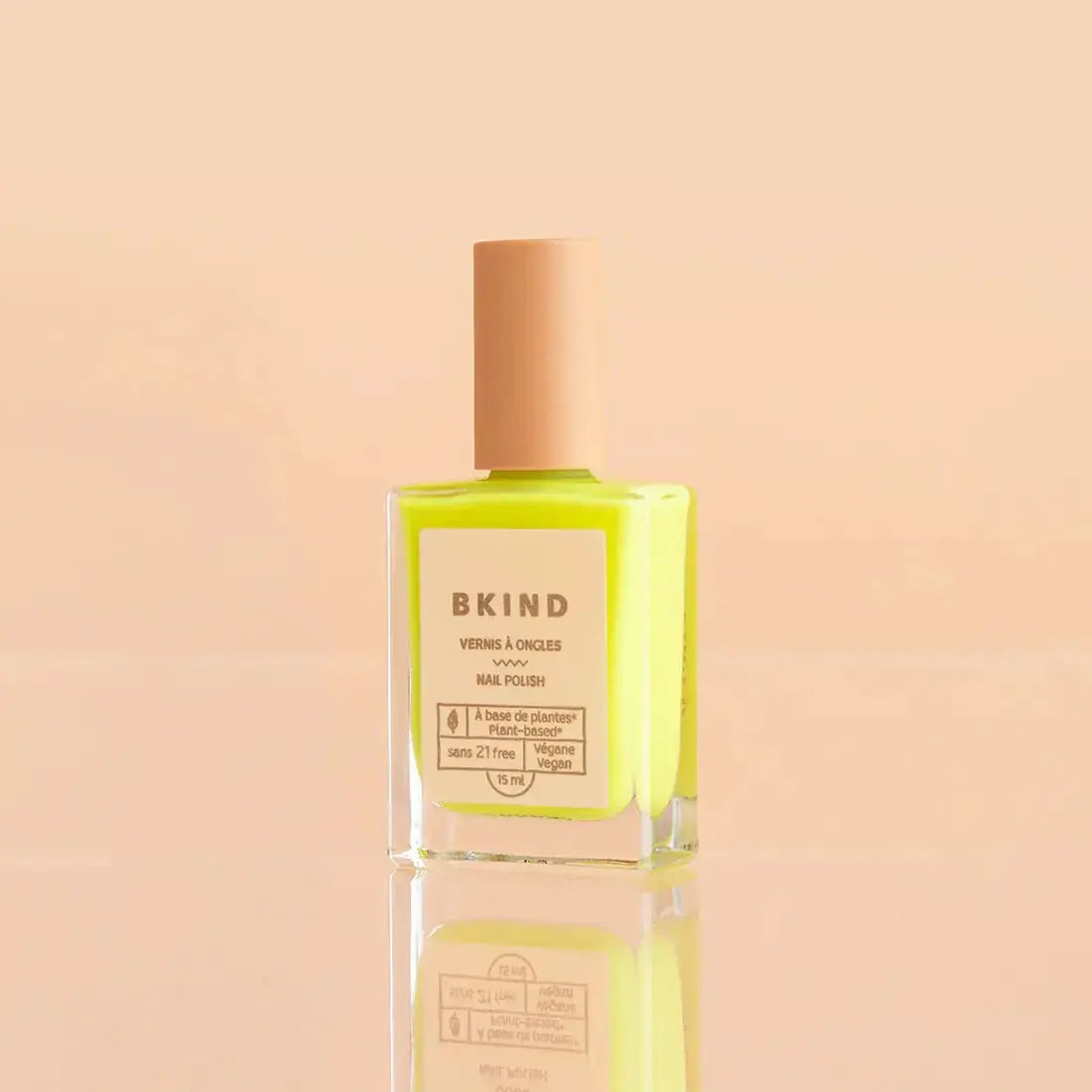 Close-up of BKIND Wild Bkind Polish bottle showing the product label and packaging details.