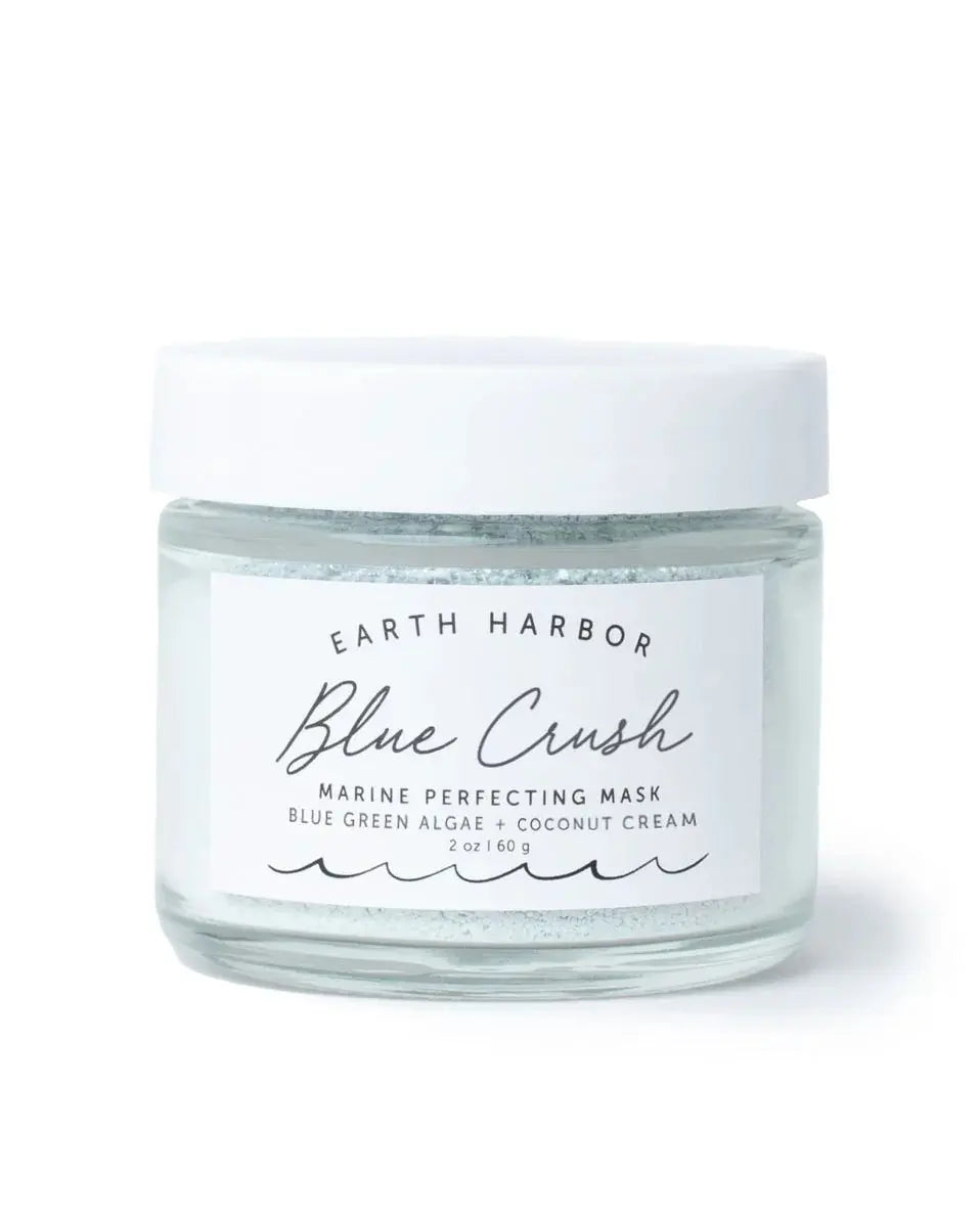 Earth Harbor Blue Crush Marine Perfecting Mask displayed in a jar with a vibrant blue color and natural ingredients.
