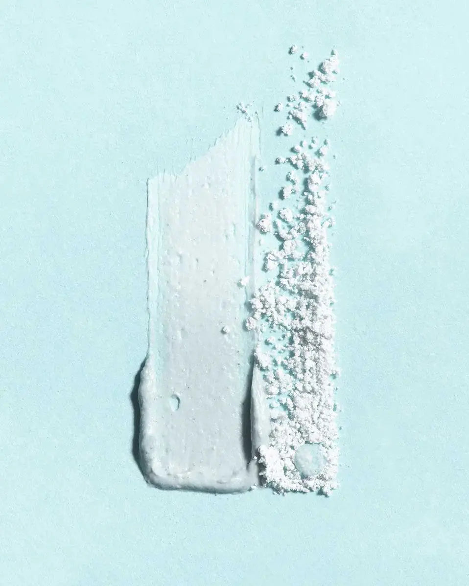 Earth Harbor Blue Crush Marine Perfecting Mask in a jar, with a blue-hued cream texture and natural ingredients for skin rejuvenation.
