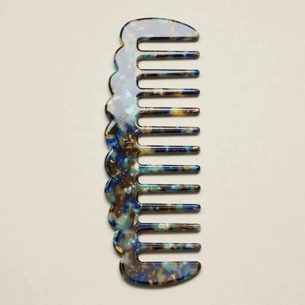 Pink confetti Frem Varsity Comb hair accessory with a colorful, patterned design for stylish hair styling.