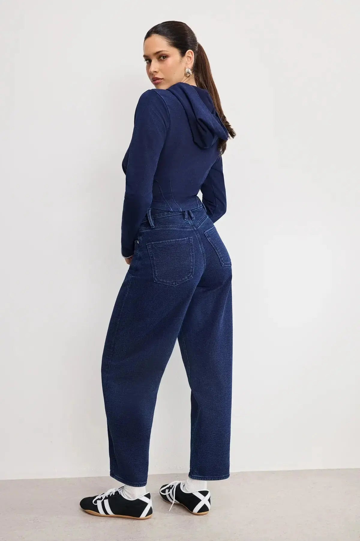 Good American Jeanius Barrel Pants, stylish denim apparel featuring a relaxed fit and high-rise design.