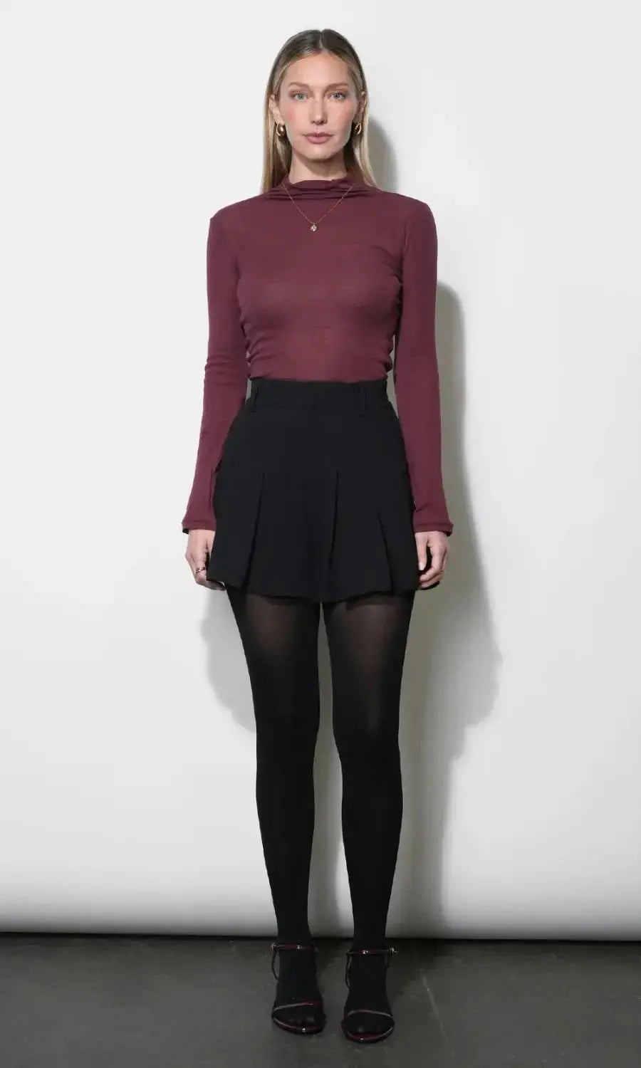 Greylin Collette pleated skort in neutral fabric, featuring a high waist and summer-ready style, perfect for casual or dressy wear.