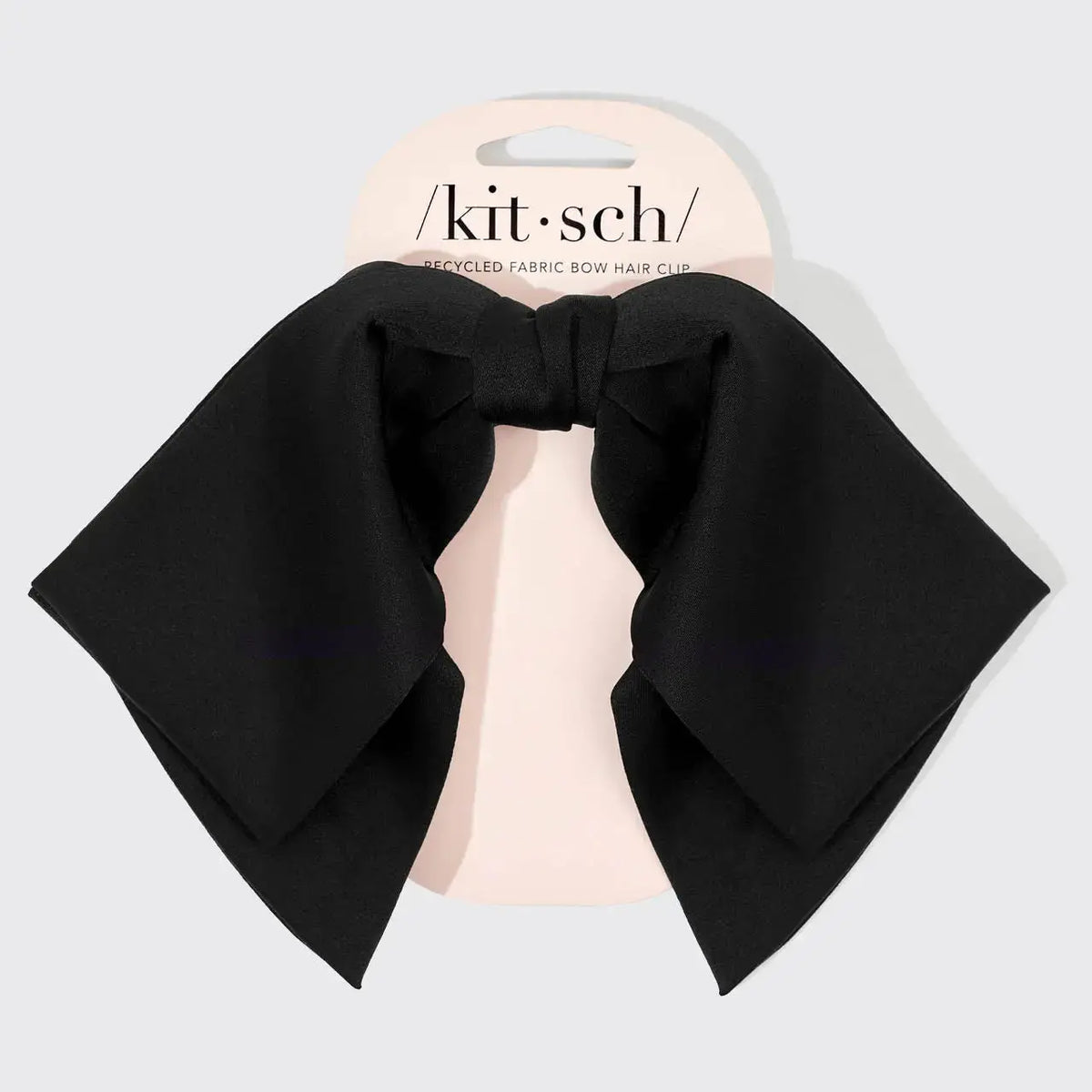 Fabric bow hair clip from hair hair accessories featuring a stylish, soft fabric bow for hair styling and decoration.
