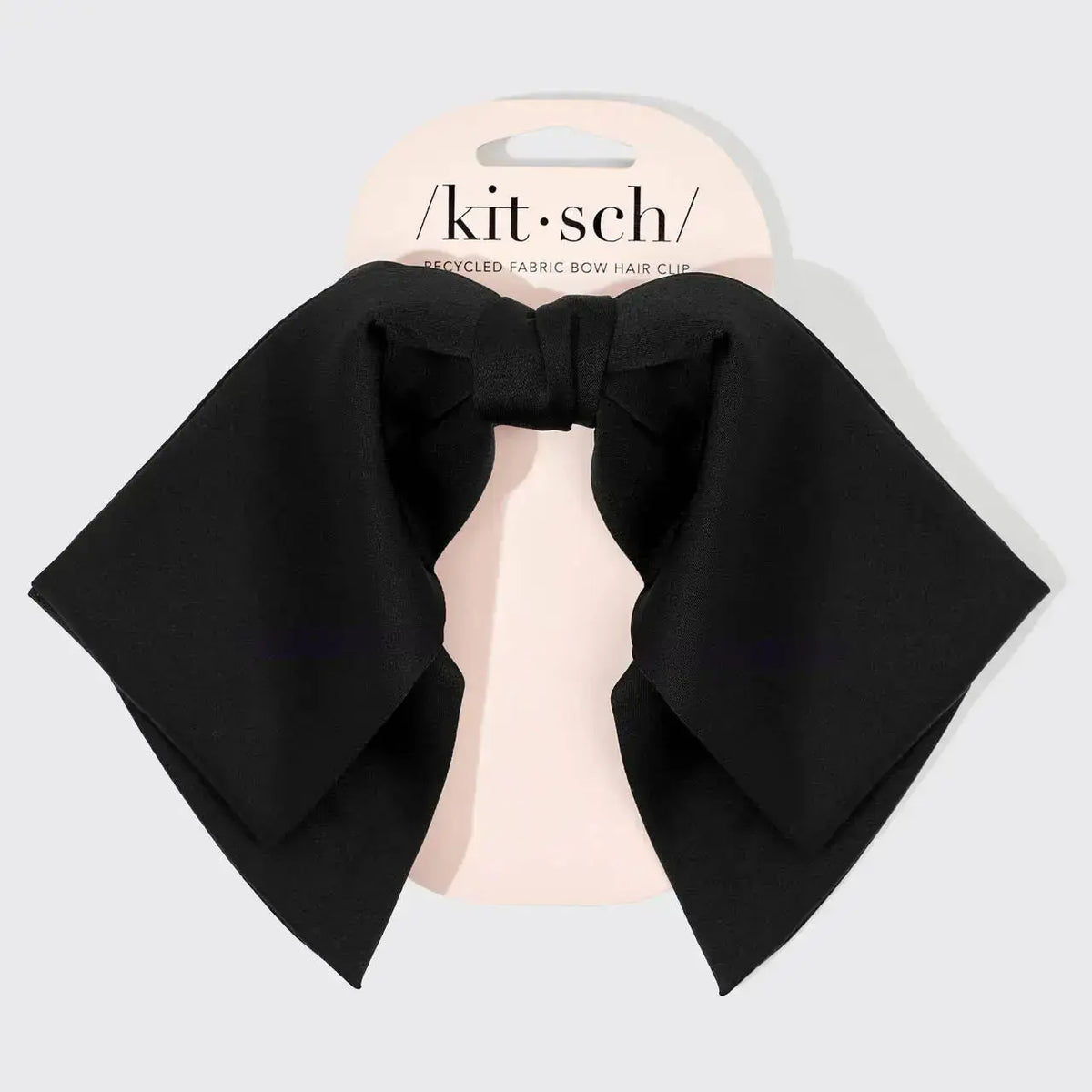Fabric bow hair clip from hair hair accessories featuring a stylish, soft fabric bow for hair styling and decoration.