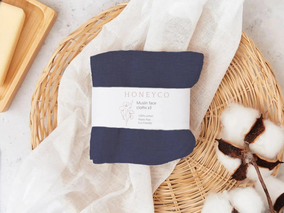 Set of green HoneyCo muslin reusable face cloths, soft and eco-friendly for gentle facial cleansing.