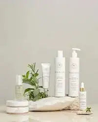 Innersense Organic Beauty Hair Renew Scalp Hairbath bottle with white and green label, designed for nourishing scalp and hair care.