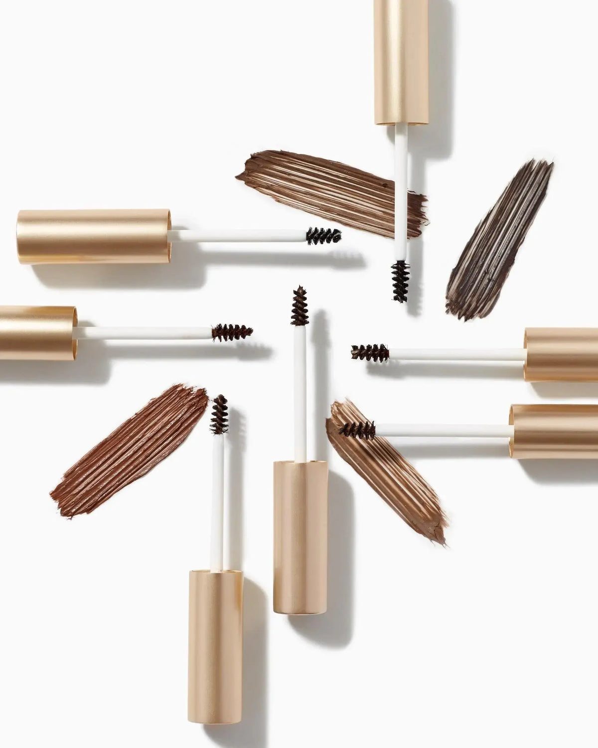 Jane Iredale PureBrow® brow gel in ash blonde with a clear tube and brush applicator, showcasing the product and branding.