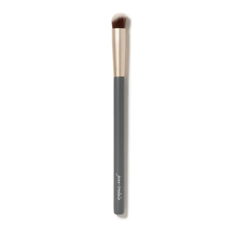 Jane Iredale concealer brush with soft bristles for precise makeup application, shown in a close-up view.