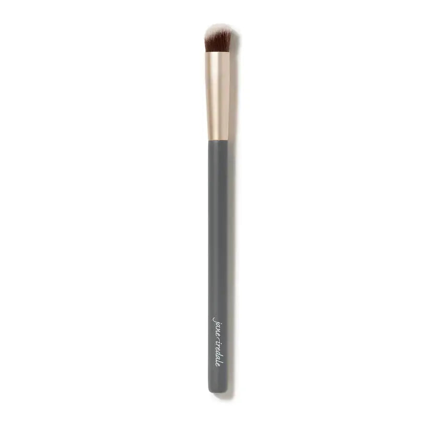 Jane Iredale concealer brush with soft bristles for precise makeup application, shown in a close-up view.