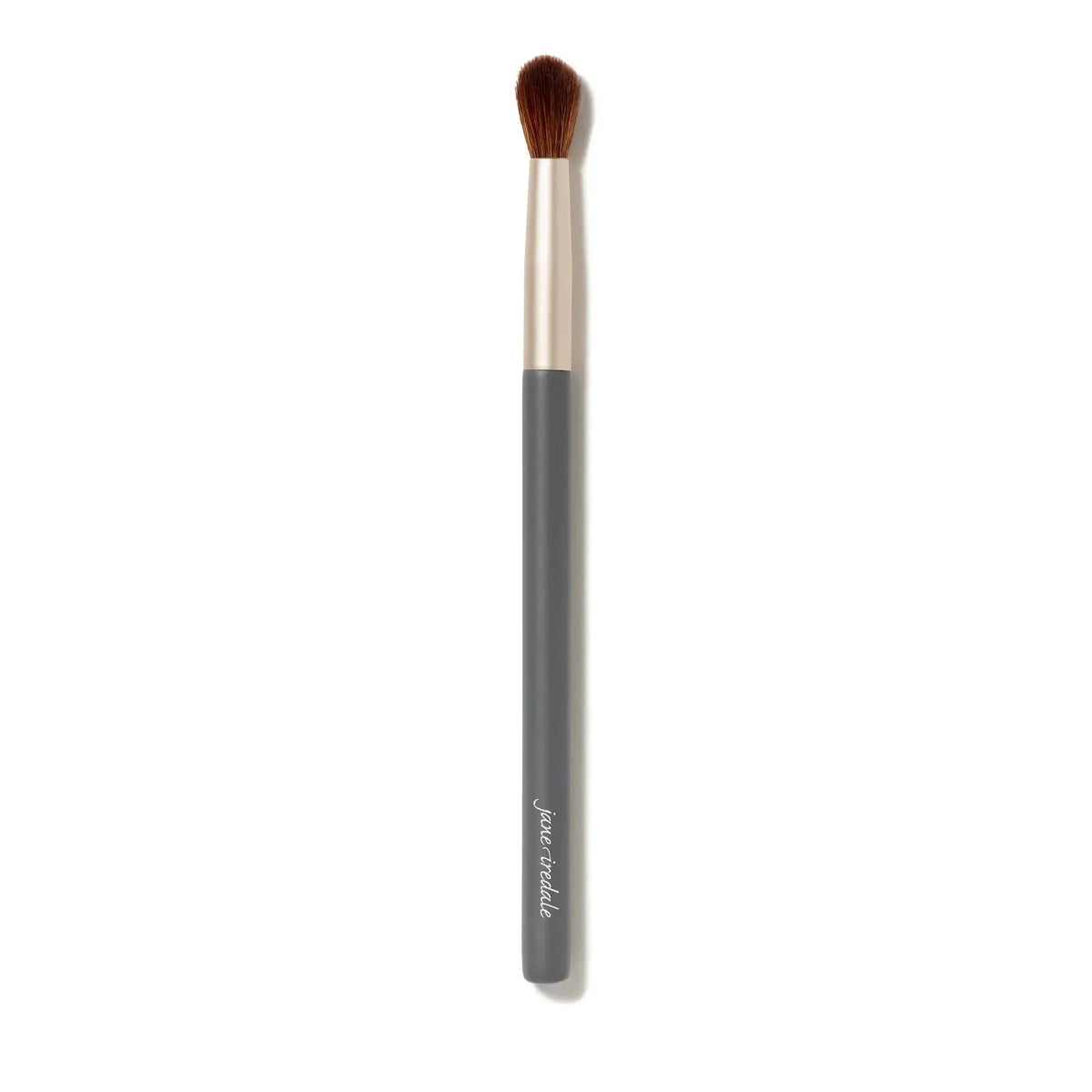 Jane Iredale crease brush with soft bristles for blending eyeshadow in a sleek, professional makeup applicator design.