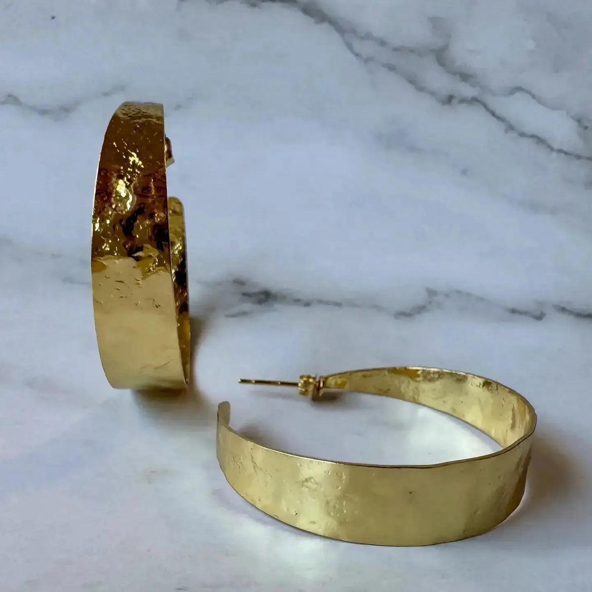 Hammered gold hoops from Jessica Matrasko Jewelry's Soleil collection, stylish hammered jewelry earrings.