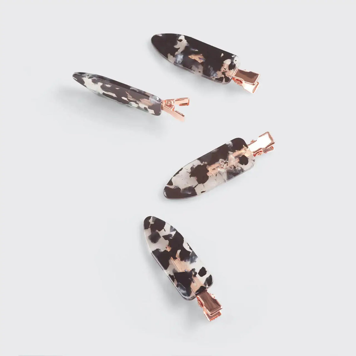 Kitsch creaseless clips for apparel, small metal hair clips designed to hold hair securely without creasing.