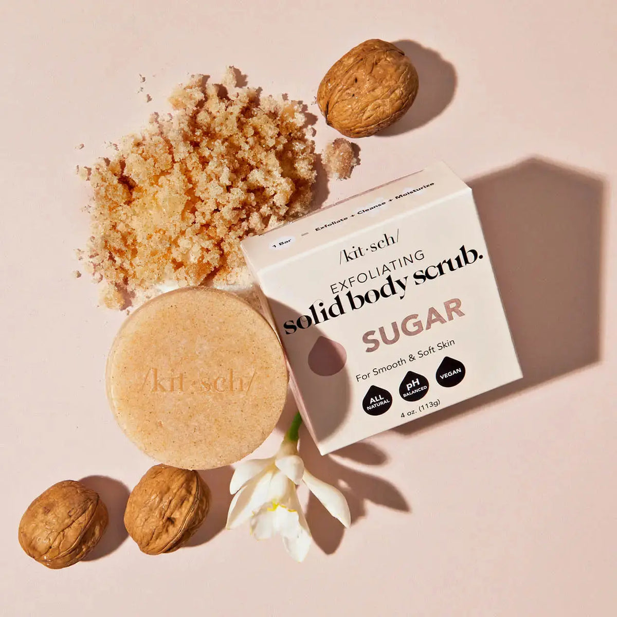 Kitsch Sugar Exfoliating Body Scrub Bar with textured surface, designed for smooth, refreshed skin in bath and body care.