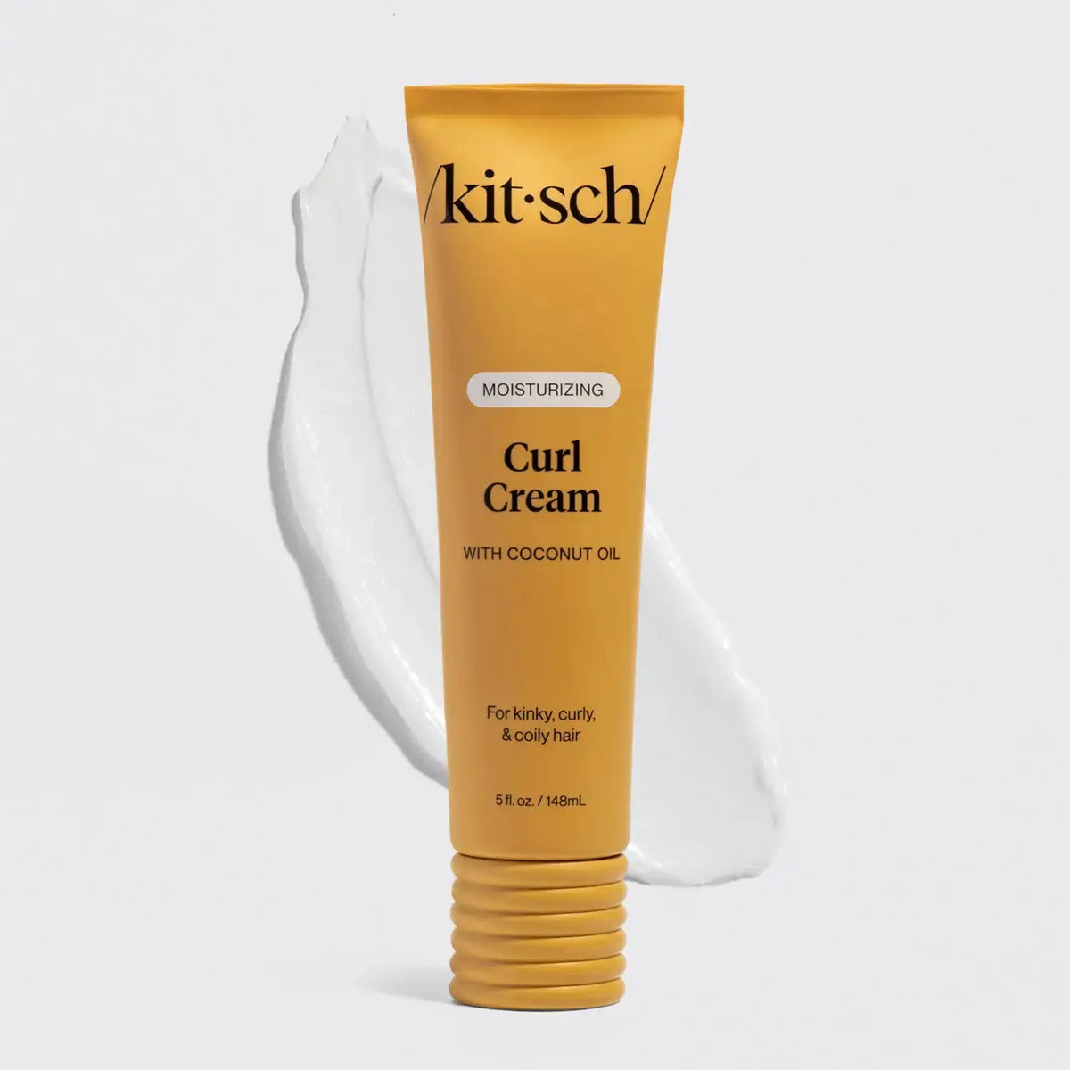 Kitsch Moisturizing Curl Cream in a jar, showing the creamy texture and label on the product for defining and hydrating curly hair.