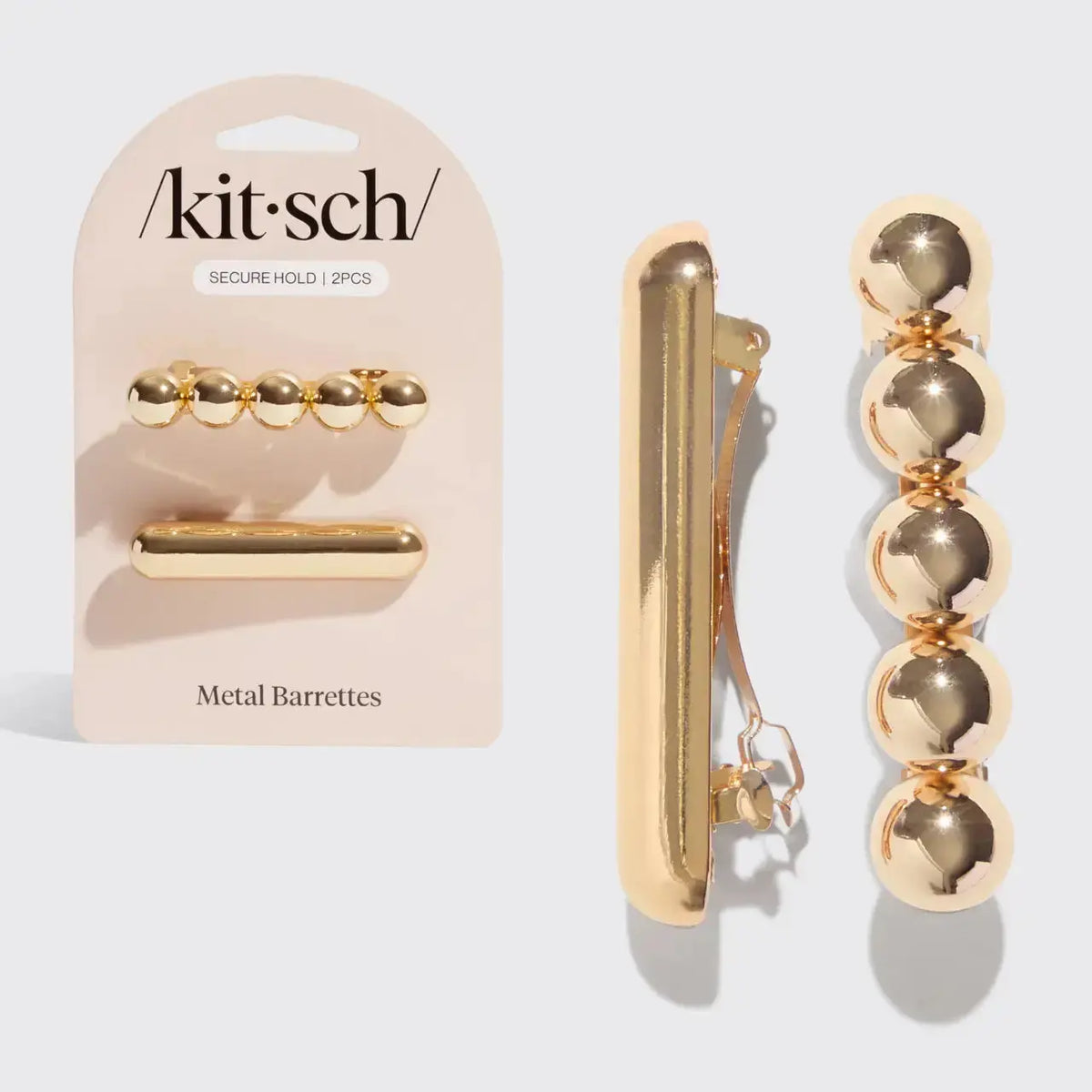 Kitsch Dash&Dot hair barrettes with colorful, decorative designs, perfect for securing and accessorizing hair styles.