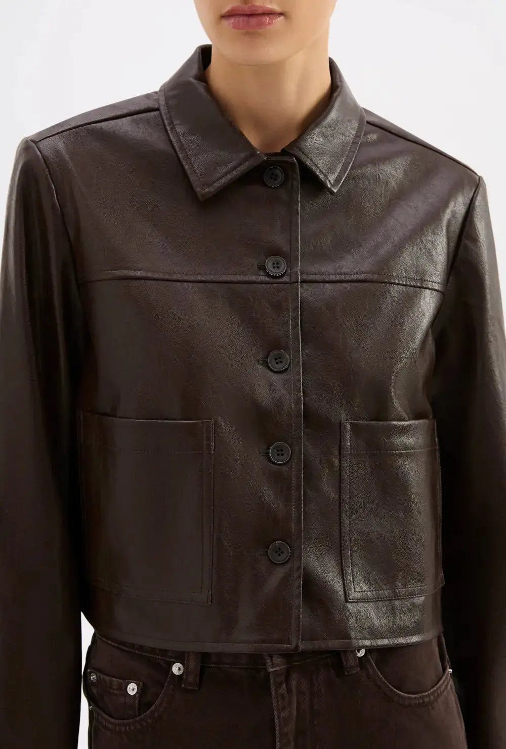 Nude Lucy Lenny vegan leather jacket, small size, stylish apparel with a sleek design and smooth black vegan leather material.