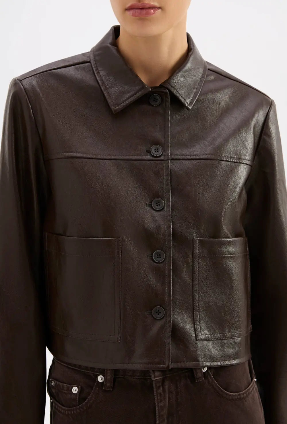 Nude Lucy Lenny vegan leather jacket, small size, stylish apparel with a sleek design and smooth black vegan leather material.