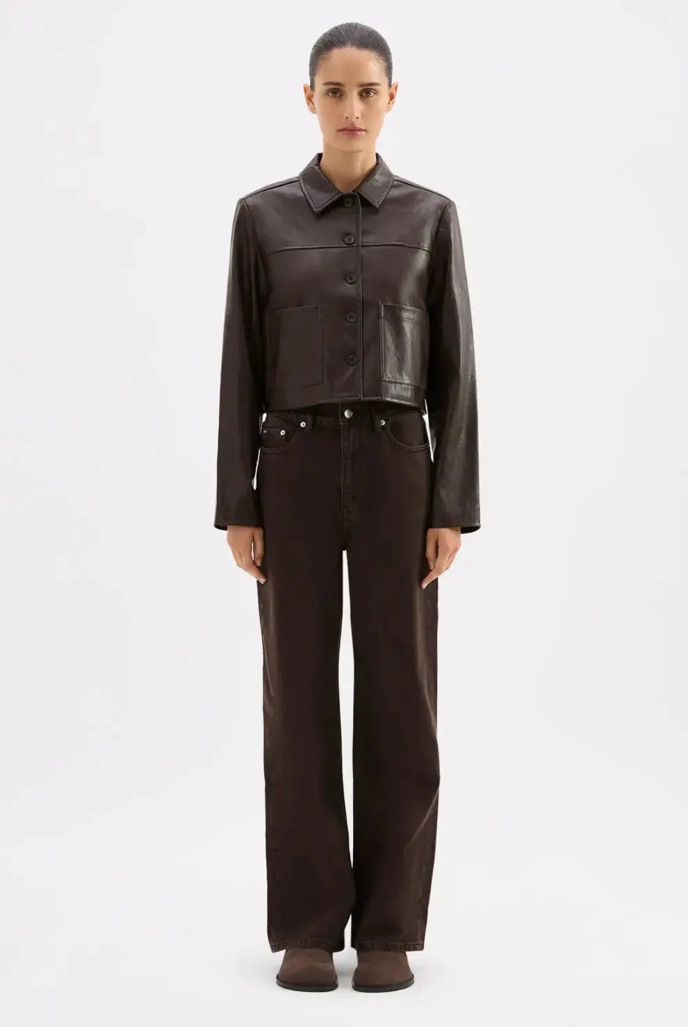 Nude Lucy Lenny vegan leather jacket in extra small size, black apparel with a sleek, modern design and smooth leather texture.