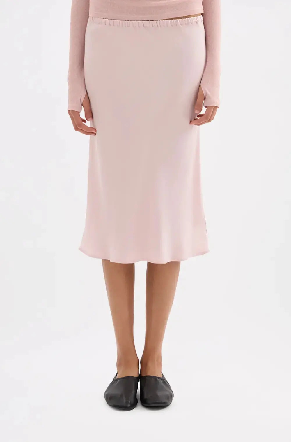 Nude Lucy Tilly Tencel Bias Midi Skirt in light blue, flowing design, made from soft Tencel fabric, styled for casual or dressy wear.