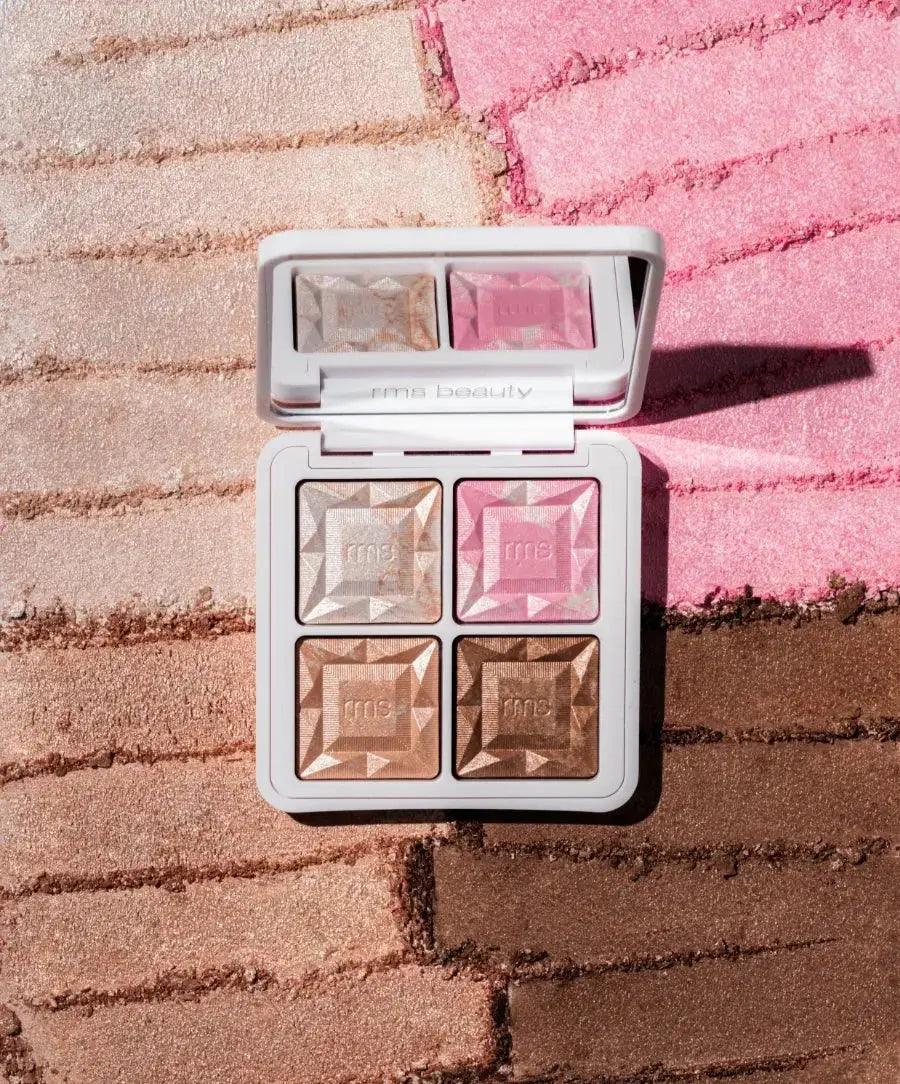 RMS Beauty Redimension Daily Glow Palette with multiple makeup shades and natural glow finish, displayed in a sleek compact.