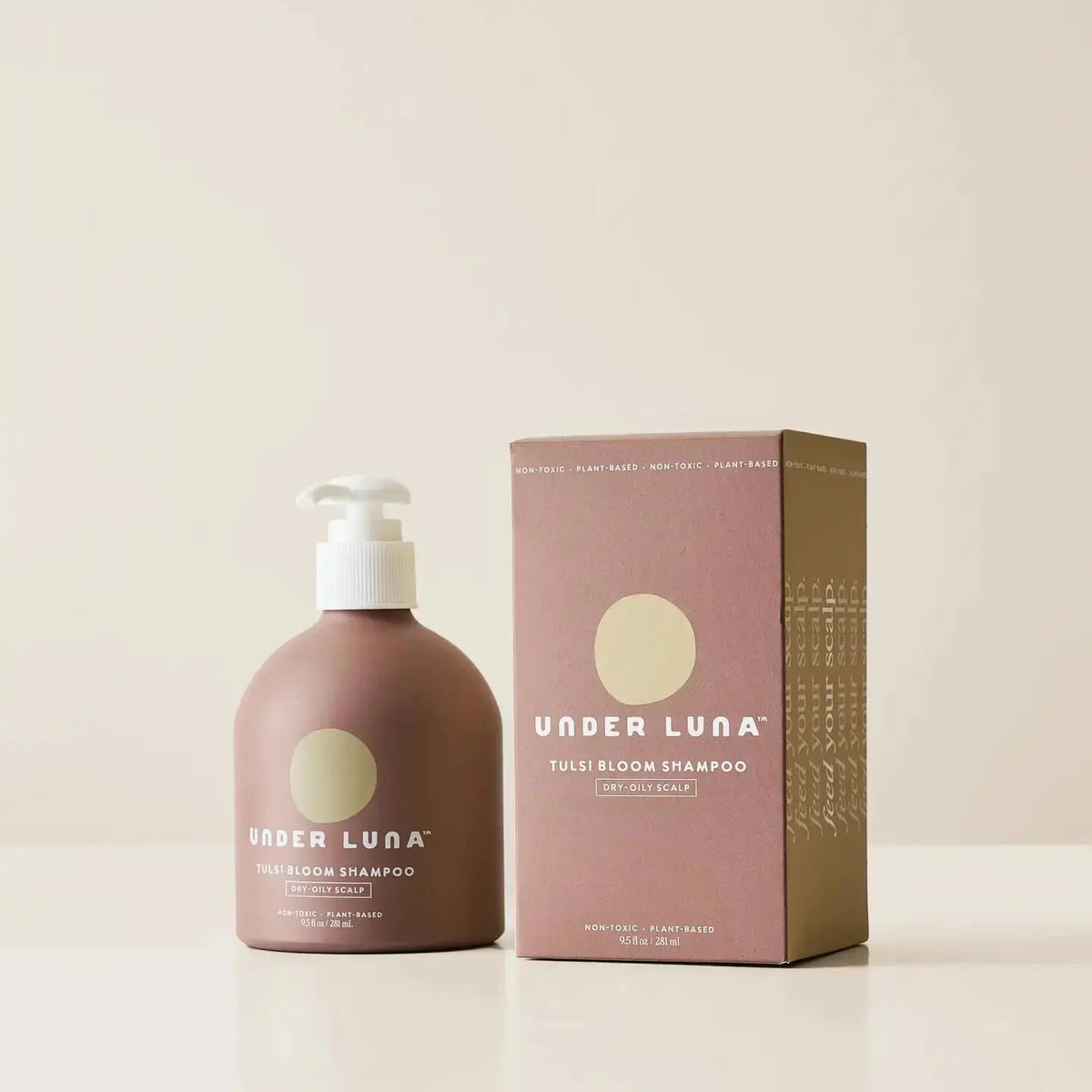 Under Luna Tulsi Bloom Shampoo in a 2oz bottle, showing the herbal shampoo with botanical ingredients and natural packaging.