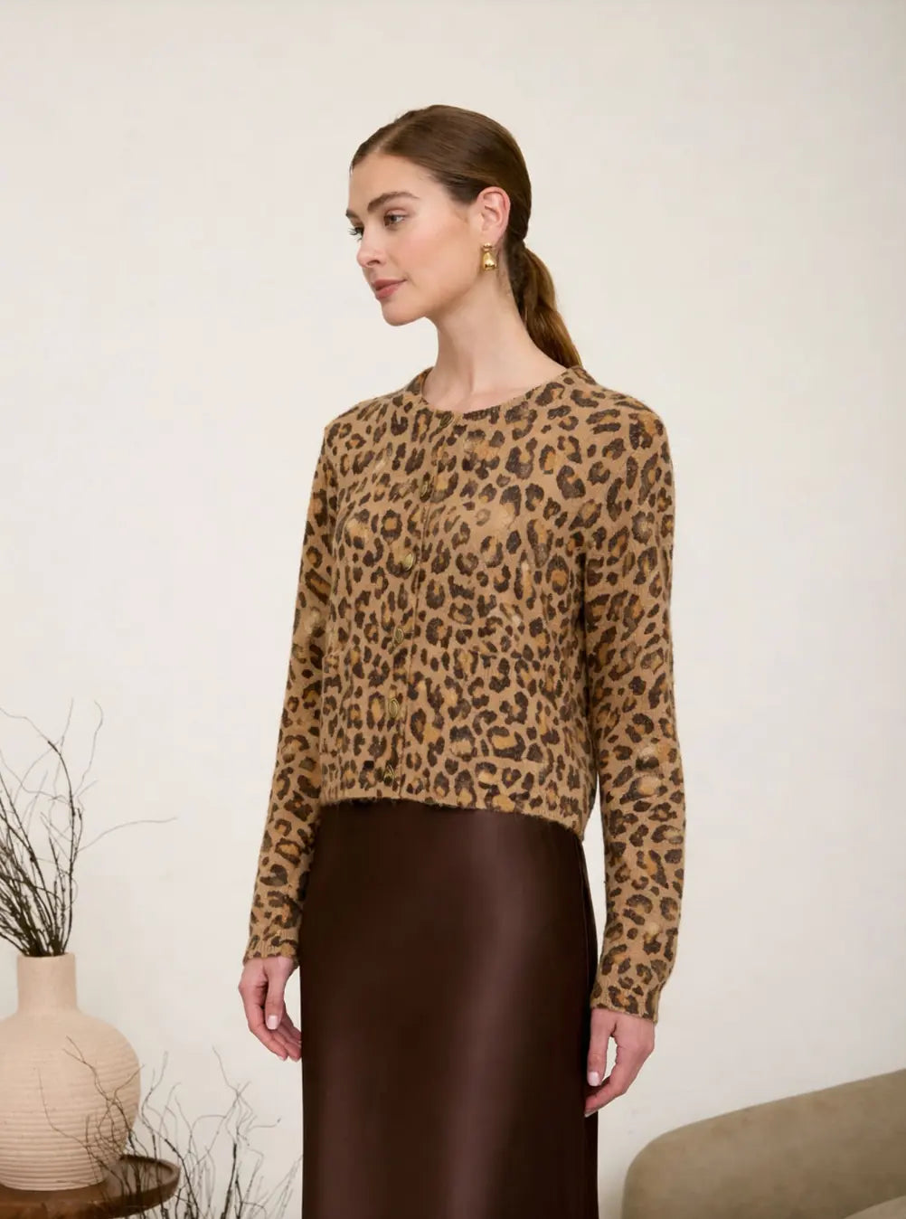 Extra small Sienna Leopard Cardigan by Zoe & Claire showing a cozy, patterned knit cardigan with leopard print in warm tones.