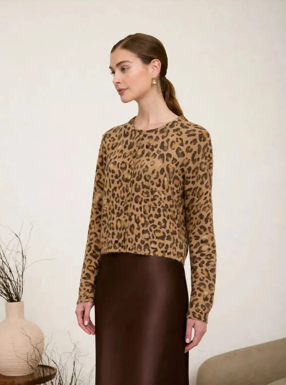 Extra small Sienna Leopard Cardigan by Zoe & Claire showing a cozy, patterned knit cardigan with leopard print in warm tones.