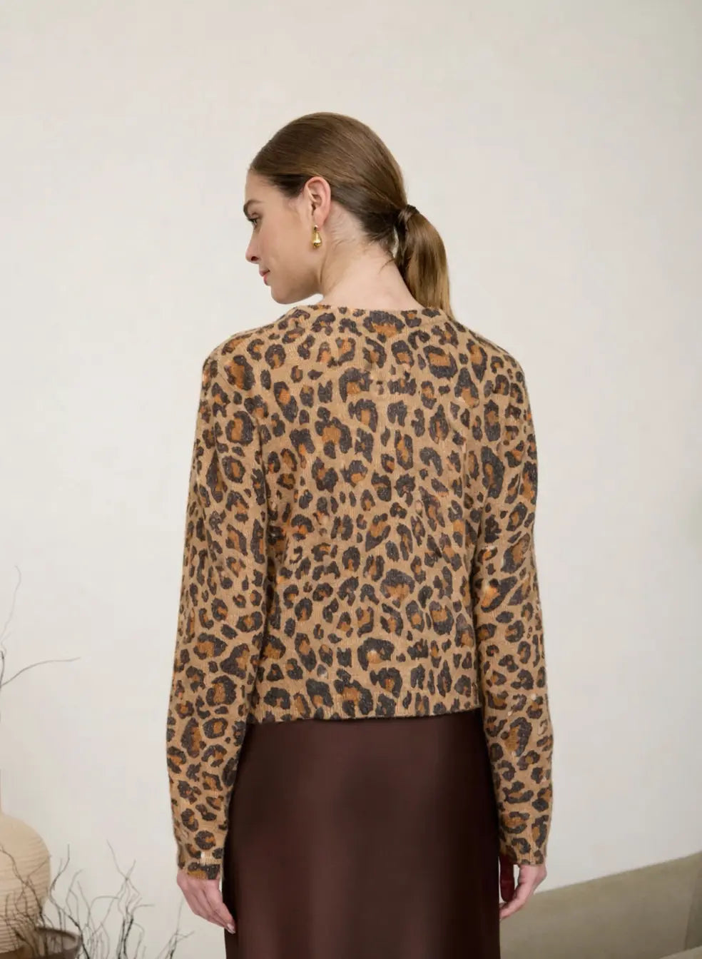 Extra small Zoe & Claire Sienna Leopard Cardigan featuring a cozy knit fabric and a stylish leopard print design.