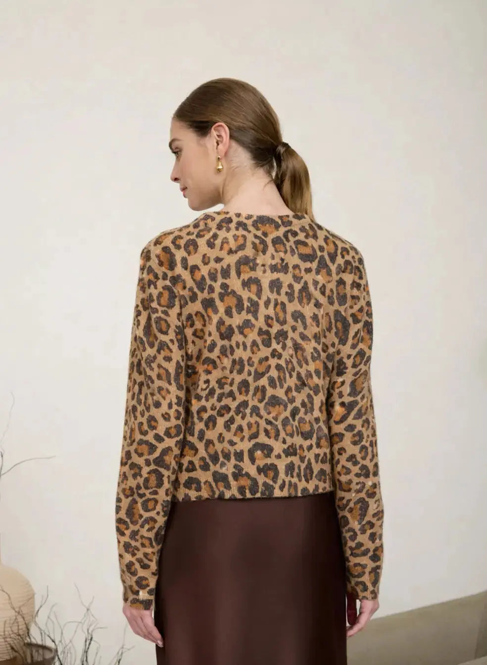 Extra small Zoe & Claire Sienna Leopard Cardigan featuring a cozy knit fabric and a stylish leopard print design.