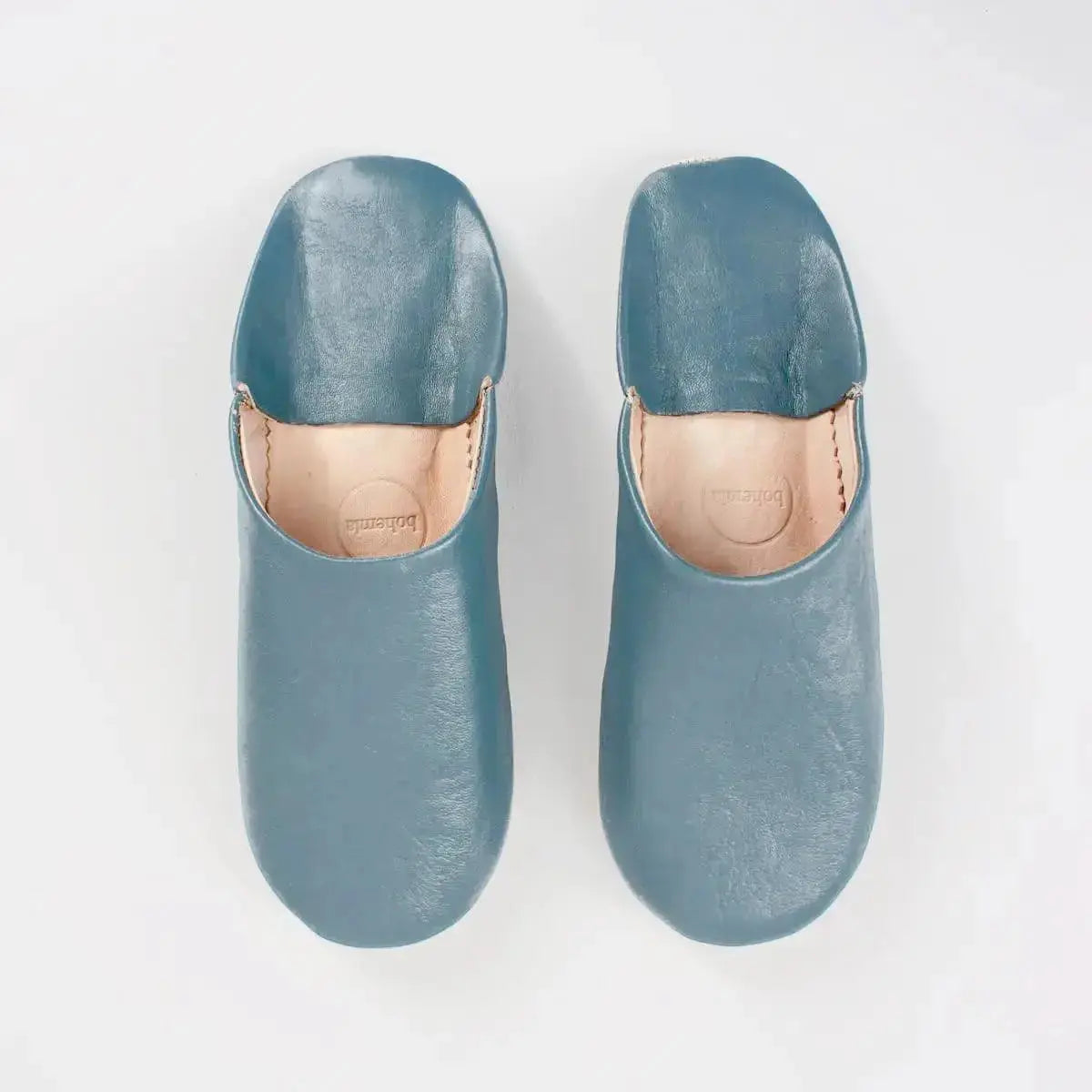 Solid Moroccan leather slippers by Bohemia Design featuring a chalk color and handcrafted design, displayed on a plain background.