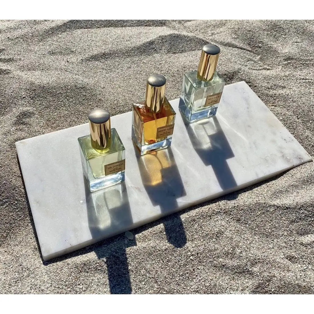 Bohemian Reves Ginger Botanical Perfume in a 10ml roller bottle, featuring fresh ginger scent and botanical fragrance elements.