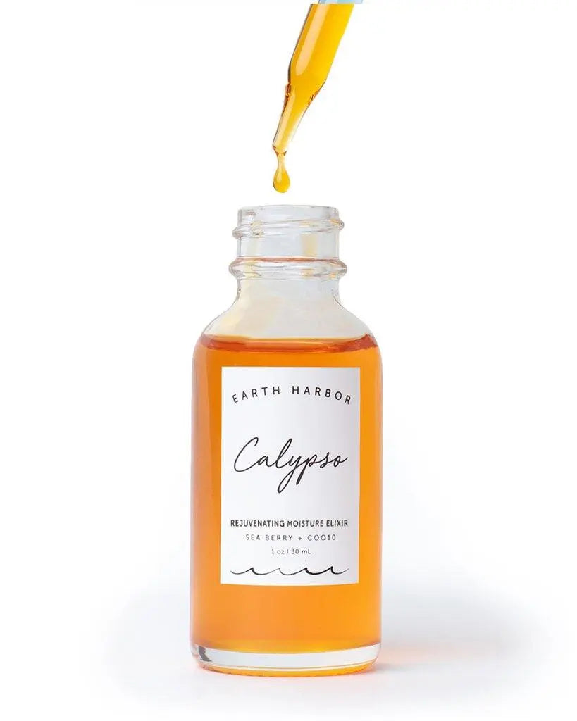 Earth Harbor Calyspo Antioxidant Glow Facial Oil in a glass bottle with a dropper, emphasizing its skincare and natural ingredients.