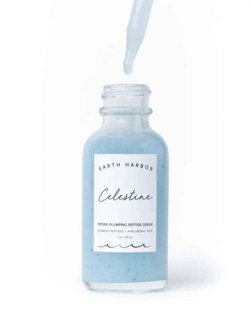 Earth Harbor Celestine Hydra-Peptide Firming Serum in a glass bottle with dropper, for skincare and skin firmness enhancement.