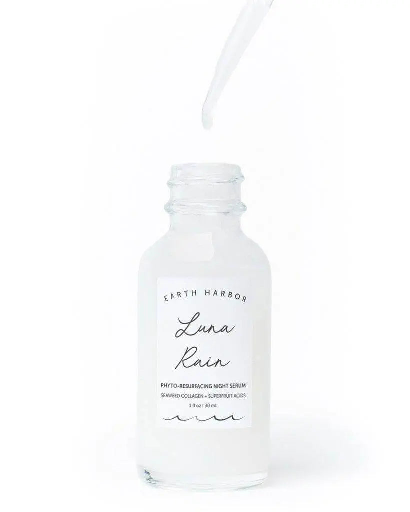 Earth Harbor Luna Rain Phyto-Resurfacing Night Serum in a glass dropper bottle, showcasing its hydrating and rejuvenating skincare formula.