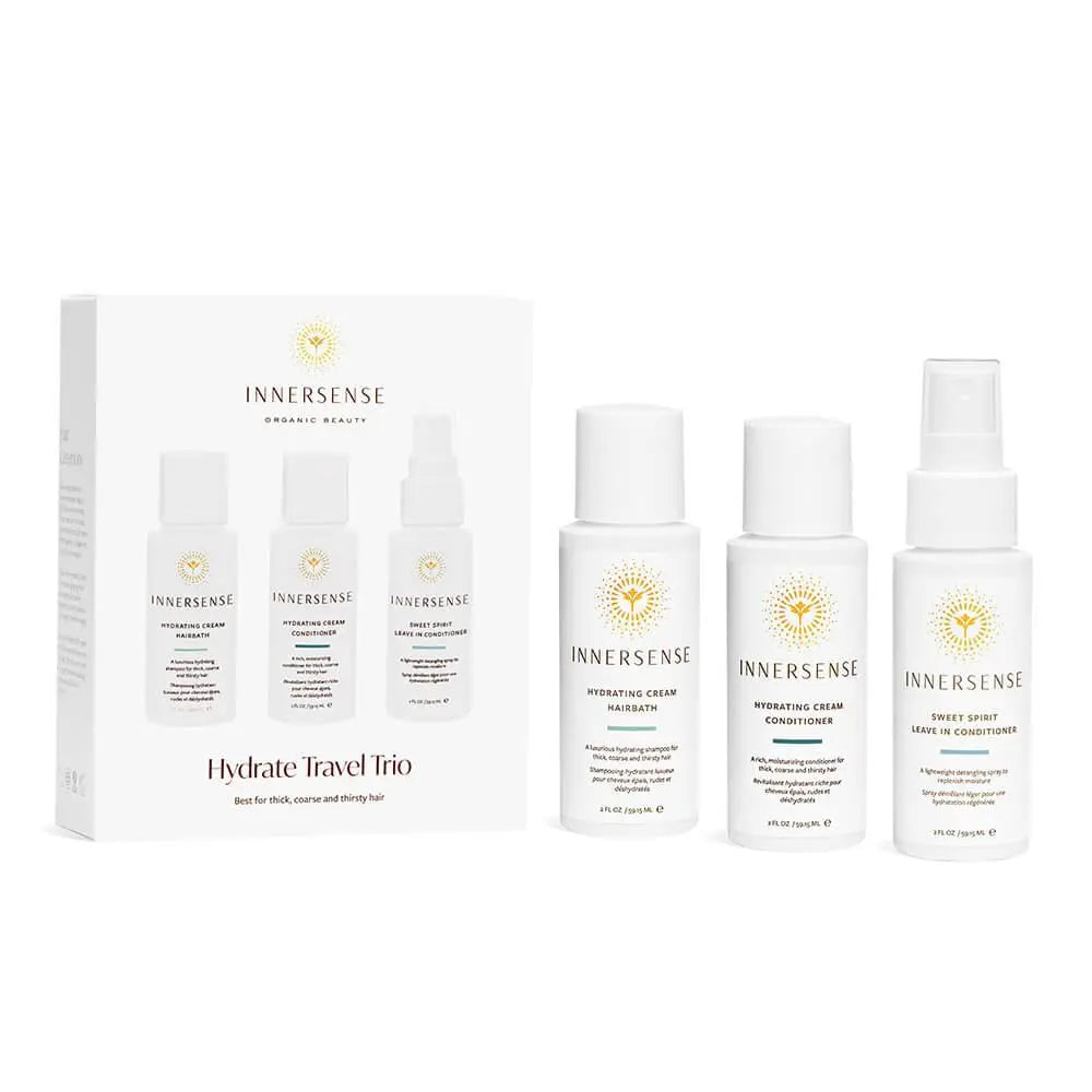 Innersense Organic Beauty Hydrate Travel Trio of haircare products with bottles and packaging for moisturizing hair care.