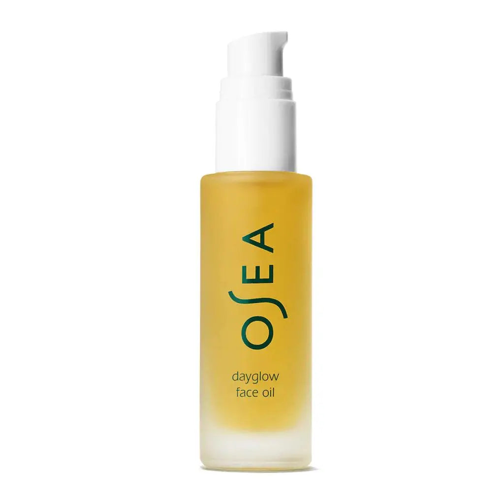 Osea Dayglow Face Oil in a clear glass bottle with a dropper, part of Osea's skincare collection for radiant, glowing skin.