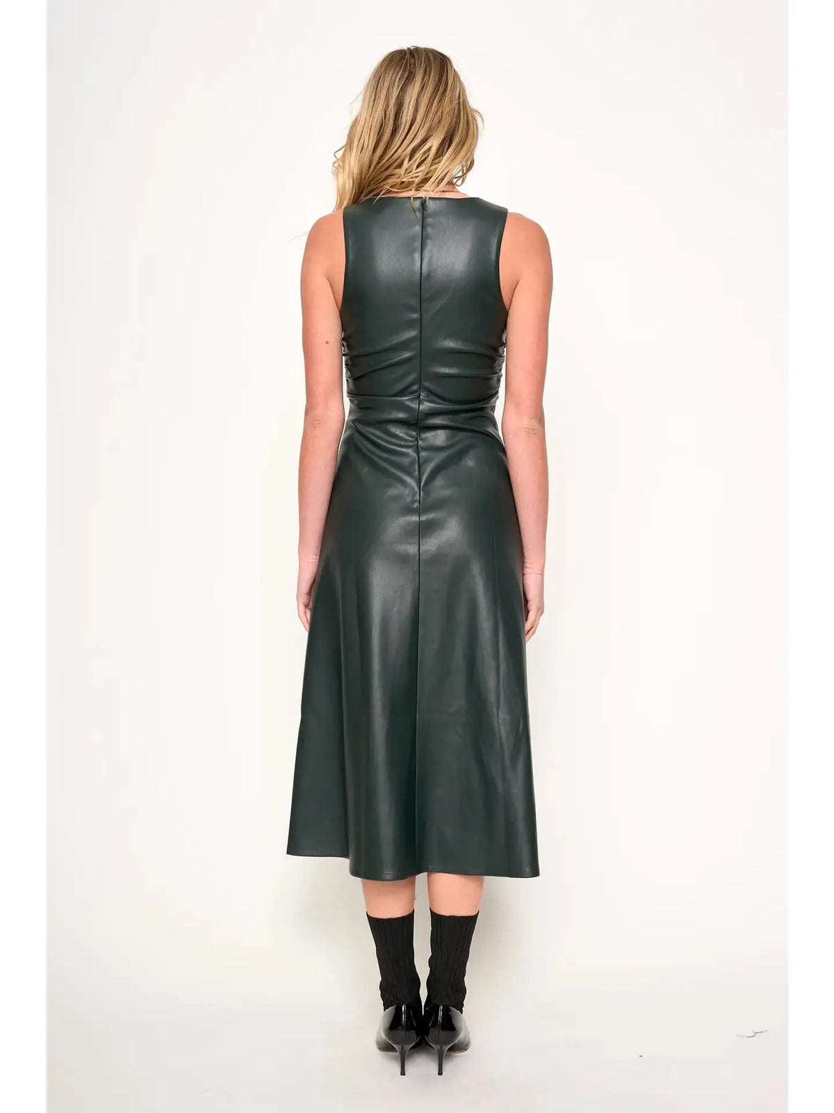 Celeste Dress by dRA Los Angeles, stylish apparel with a flowing silhouette, displayed on a hanger against a neutral background.