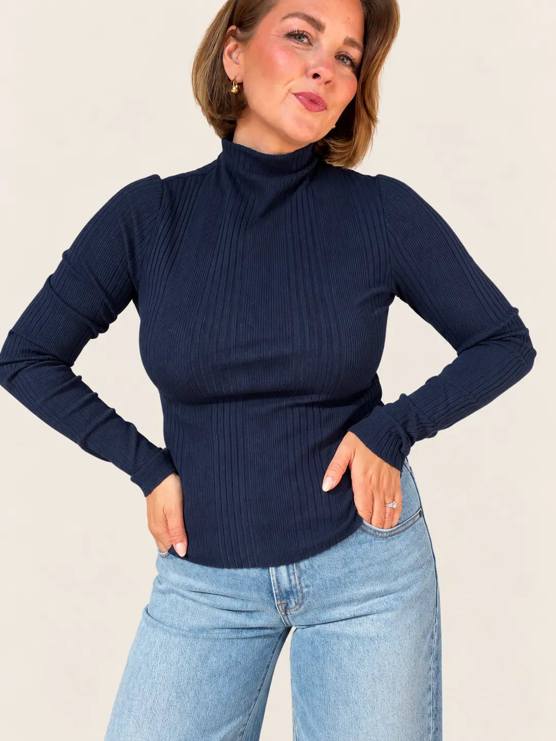 Gray Ellis Ribbed Mock Neck apparel by Stateside, showing the close-up of the ribbed fabric and mock neckline design.