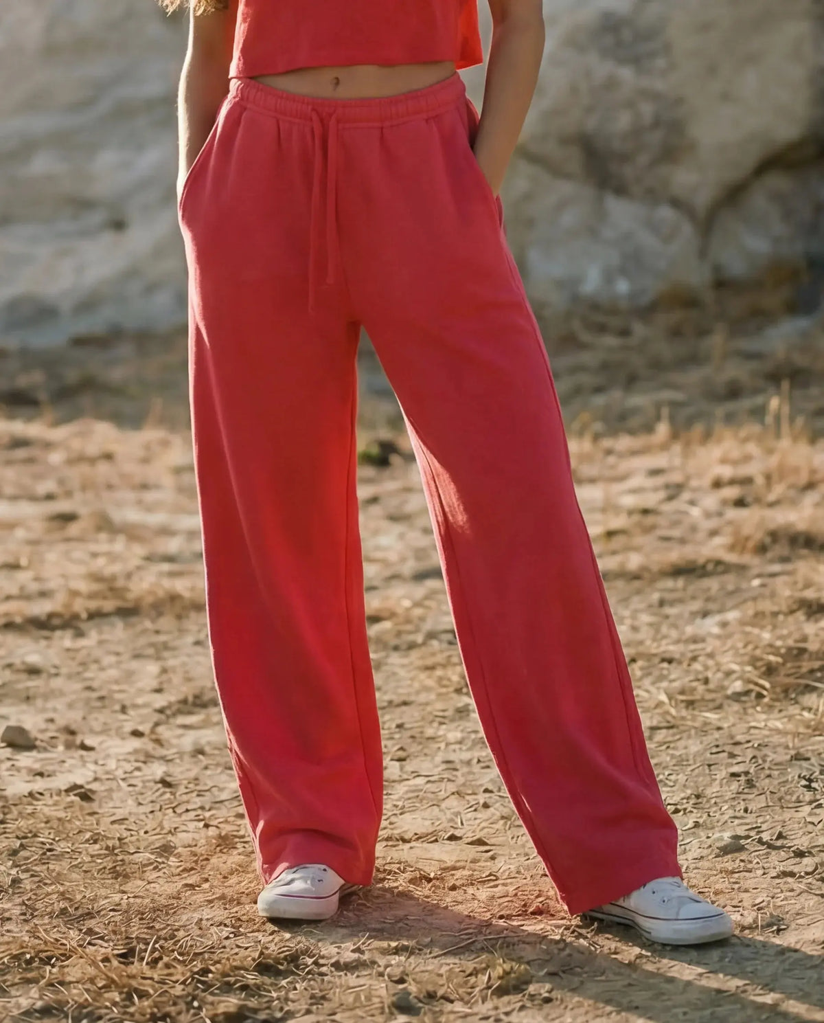 Sundry Berry wide-leg track pant with five-pocket design, featuring a relaxed fit and vibrant berry color.