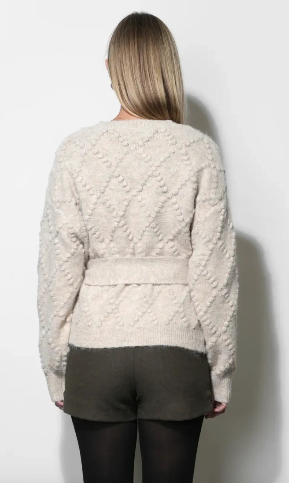 Greylin Bonnie pom pom belted cardigan featuring a cozy knit design with pom pom accents and a waist belt for a stylish look.