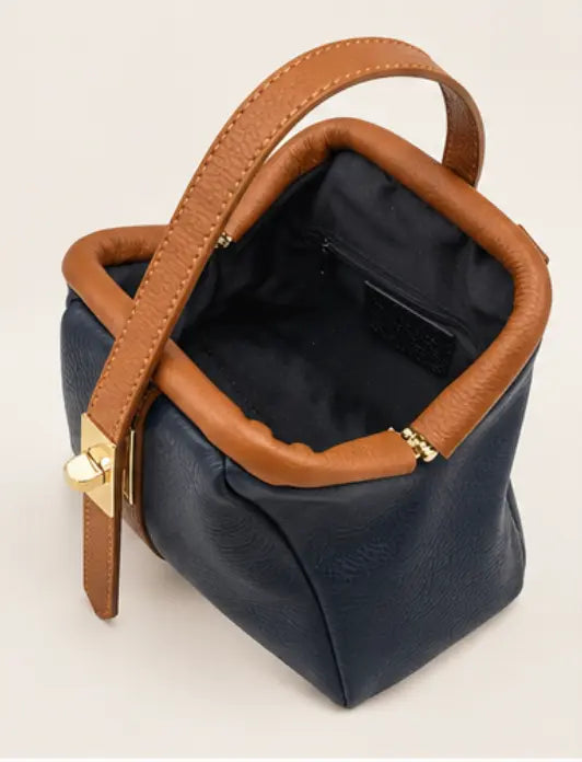Suie Valentini Margot handbag purse in a structured silhouette, shown against a plain background