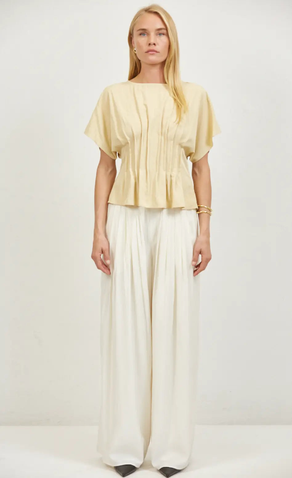 A.ren Leah Top in extra small size, stylish women's apparel with a fitted design and soft fabric, displayed on a neutral background.