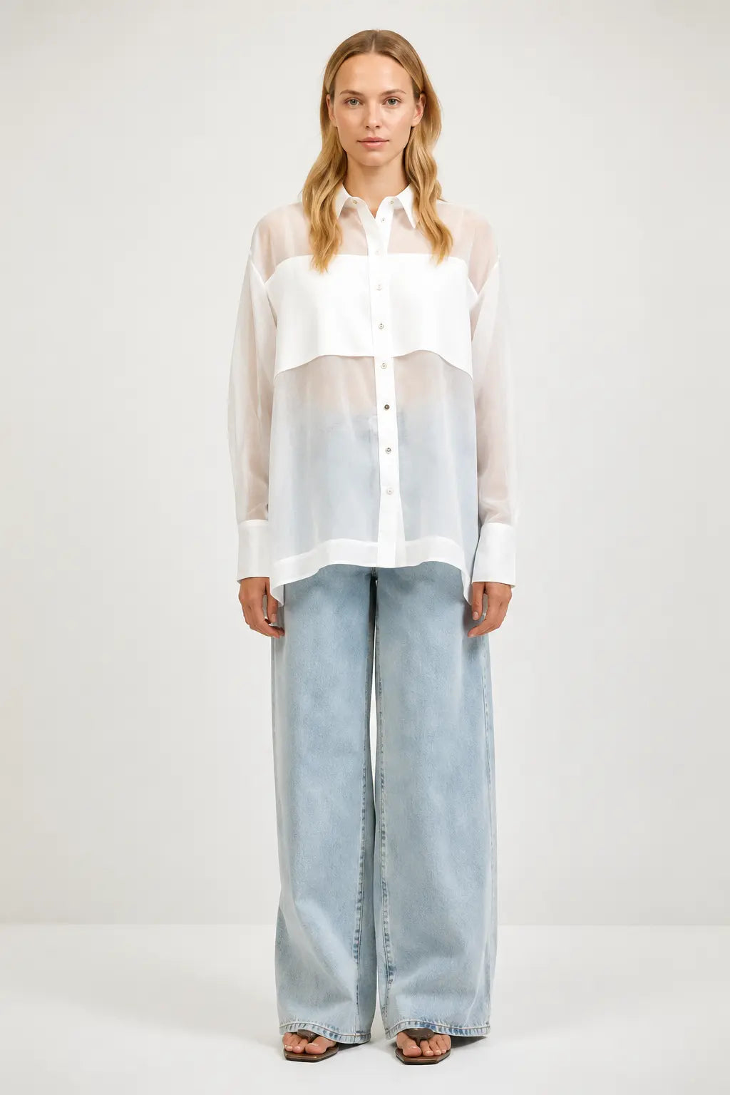 A.ren The Renee Top, stylish women's apparel, featuring a fitted design with long sleeves and a round neckline.