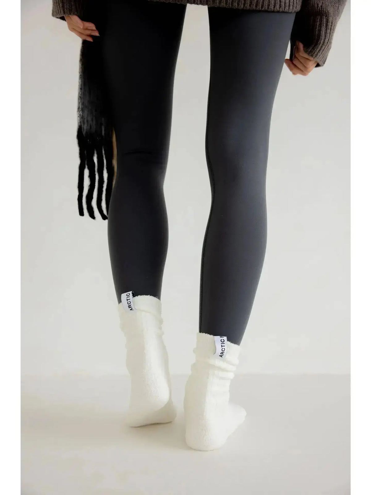White Arctic Fox cozy socks, soft and warm apparel with a comfortable fit, perfect for staying cozy at home.