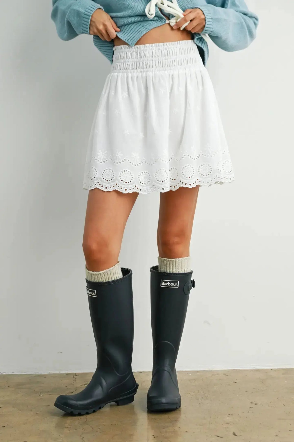 Buttermelon Sunday Picnic Skirt in lightweight fabric with a floral pattern, styled for casual summer wear.